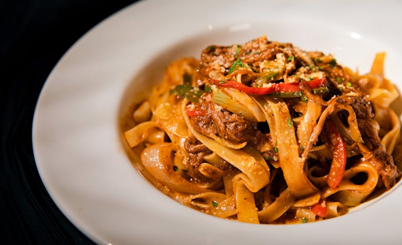 Bolognese Ragu pasta bowl with fresh tagliatelle